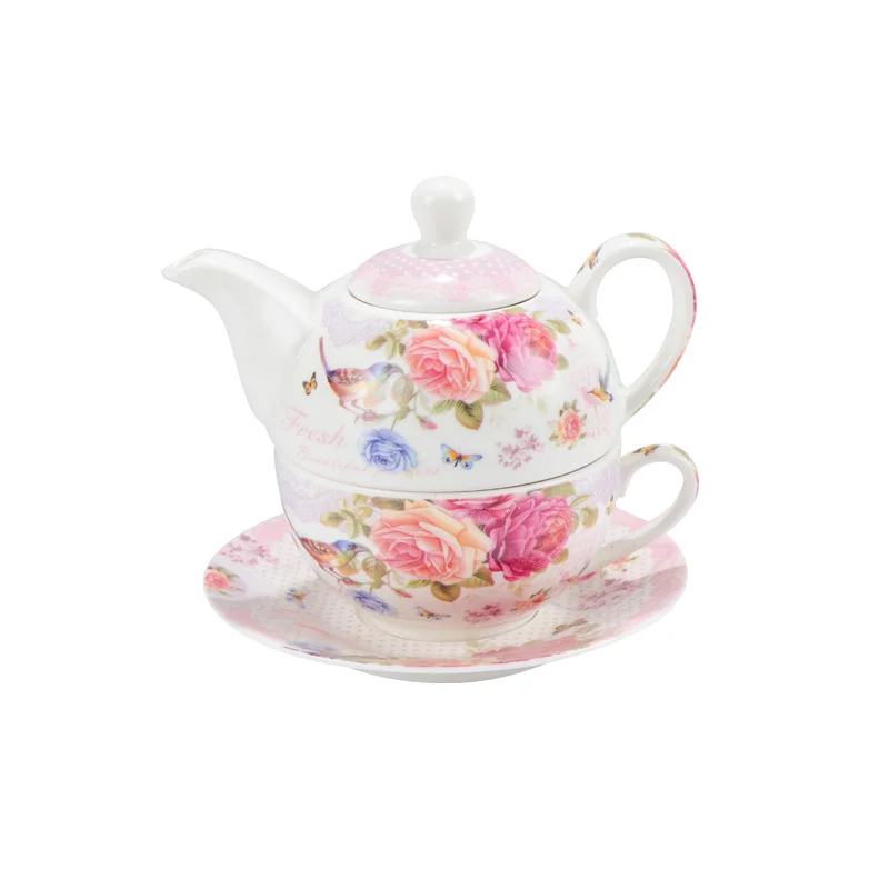 Personal Teapot With Cup and Saucer