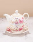 Personal Teapot With Cup and Saucer